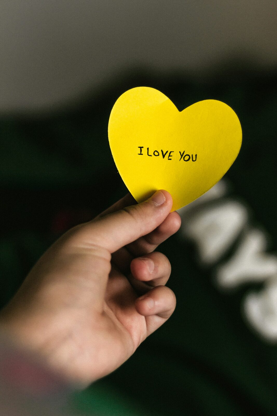 A handwritten heart on a small note